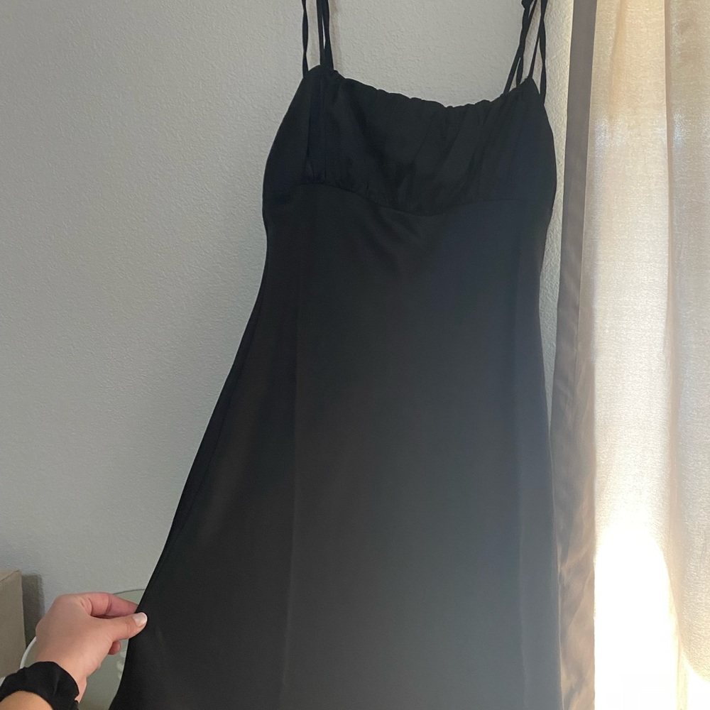 New, never worn black silk dress with scrunched